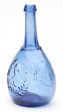 Breaking up the run of male flasks that performed well in this auction was this "Jenny Lind†and bust "(Glasshouse)/S. Huffsey†portrait calabash flask, probably Isabella Glass Works, New Brooklyn, N.J., 1845‶0. The sapphire blue quart flask with applied sloping collared mouth sold for $31,000.