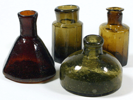 An octagonal umbrella inkwell, two octagonal ink bottles and a globular inkwell were made at Stoddard in the 1840s.