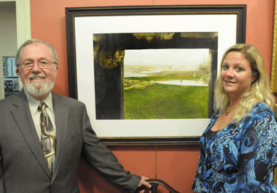 Auction house principals Gene Shannon, left, and Sandra Germain with Andrew Wyeth's "Bird Bath,†a watercolor painted from his window on Benner Island, Maine. It was acquired by an American museum for $228,000.