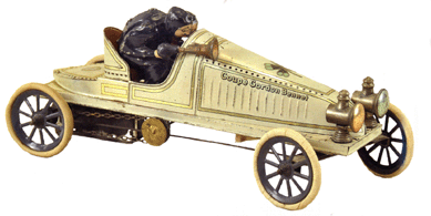 Gunthermann large Gordon Bennett Racing Car, 12 inches long, lithographed tin, two drivers crouched in racing position, had a high estimate of $20,000 and sold for $25,875. Two of the rubber tires were replaced, the spare was missing and the driver replaced. Overall condition was excellent.