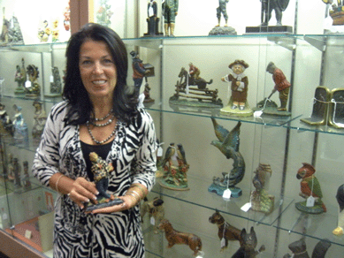 Jeanne Bertoia with one of the doorstops in the Friday sale. ⁁ntiques and The Arts Weekly photo, Smith.