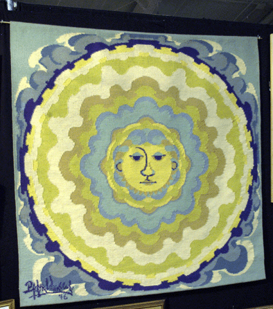 The Next Antiquarian, Arlington, Va., showed Bjorn Wjinblad's "Moon†tapestry from 1973, numbered 3/36.