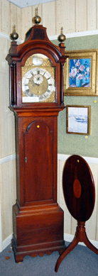 A Massachusetts mahogany tall clock by John Rogers of Newton realized $8,625.
