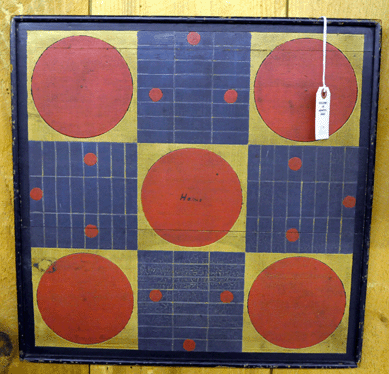 The Parcheesi board in old brightly colored paint sold in the gallery for $3,795.