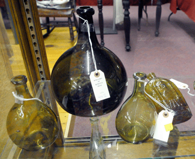 The large glob bottle brought $431, the chestnuts $373 and the Masonic flask realized $488.