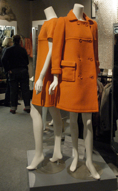Katy Kane, New Hope, Penn., shows a Courreges Paris numbered haute couture dress and coat in a wonderfully vivid orange that was especially fitting at this show as the outfit was made for Modernist designer Florence Knoll.
