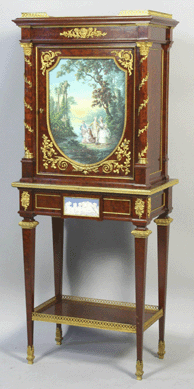 Mid-Nineteenth Century French plum mahogany two-part cabinet signed "Millet a Paris†with Wedgwood Jasperware plaque and hand painted gouache scenic view realized $34,500.
