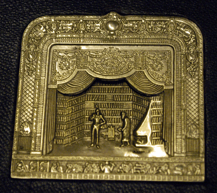 Ferro Antiques, Fairfield, Conn., offered this 14K gold bas relief of the old Metropolitan Opera, designed by Henryk Kaston in the late 1960s and initialed R.P. in diamond chips for the opera singer Robert Peters.