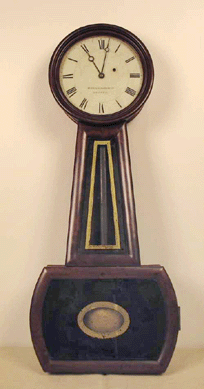 This Southeastern Massachusetts banjo clock by Foster Campos realized $2,100.  