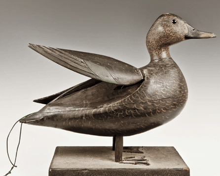 A rare standing black duck with articulated wings and rotating head by Gloucester carver Charles Hart.