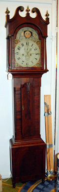 An early Nineteenth Century New Jersey tall clock by John Nicholl of Belvidere sold for $9,360.