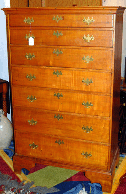 The Eighteenth Century Chippendale maple chest sold for $1,580. 