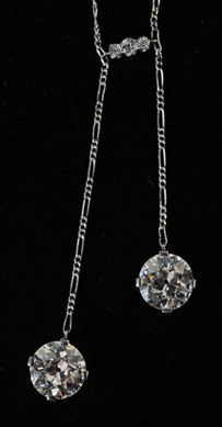 Diamond necklace with pair of 3-carat diamonds sold for $28,750.