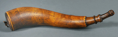 A "Crown Point†powder horn in wonderful old mellow surface finished at $18,400.
