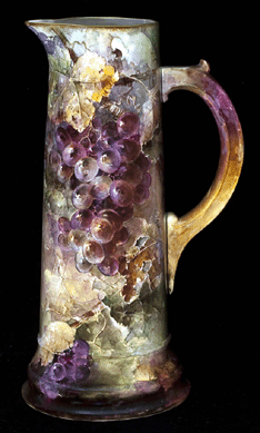 Franz A. Bischoff, "Grapes,†porcelain wine tankard, 15 inches high. Collection of Paula and Terry Trotter.