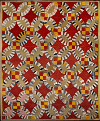 This Double Wedding Ring quilt employs vibrant colors rather than more typical pastels. It inspired the American Folk Art Museum's late director Robert Bishop to start a Double Wedding Ring collection. Artist unidentified, probably Georgia, 1930‱940. Cotton, 86¼ by 72 inches, framed. Gift of Robert Bishop. ⁇avin Ashworth photo