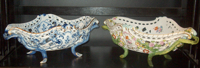 While these two pieces of Meissen are of similar form, about 50 years separates the two. The piece on the left is circa 1886 and the one at right, circa 1924. The telling is in the Meissen marks and their locations.