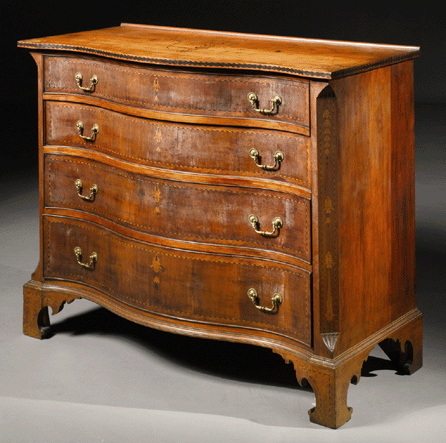 An important Searls family Chippendale highly inlaid cherry wood and mahogany chest of drawers, attributed to Nathan Lombard, Sutton, Mass., circa 1800, sold for $872,500.