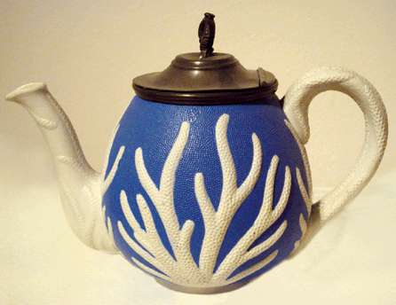 Salt-glazed teapot with hinged pewter lid; collection of Unjeria C. Jackson.