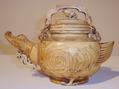 Carved ivory teapot, stylized bird, late Eighteenth Century⁥arly Nineteenth Century, collection of Unjeria C. Jackson.  This teapot is one of the collector's favorites.
