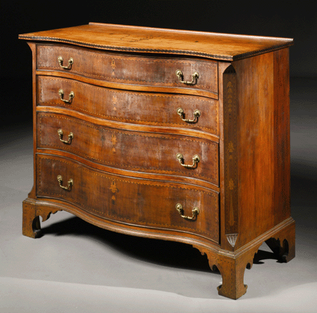 This serpentine front chest of drawers of cherry wood and mahogany descended in the Searls family of Pomfret, Conn. Its imaginative stylistic details and inlays link it to central Massachusetts craftsman Nathan Lombard, who is also thought to have made five related chests. Ebenezer Howard, a Sturbridge, Mass., craftsman who worked for Lombard, signed the chest, which sold to G.W. Samaha for $872,500. The chest fetched $365,500 when it came up at Skinner in Bolton, Mass., in 1999.