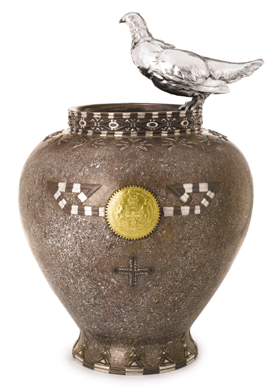 The mixed metal Ptarmigan vase of 1900‰5 sold for $662,500 to a Canadian dealer bidding on behalf of an undisclosed Canadian museum. The vase descended in the family of Tiffany designer Paulding Farnham, an investor in the Ptarmigan mines in British Colombia. Sotheby's discovered the signatures of five Tiffany craftsmen on the vase's base. 
