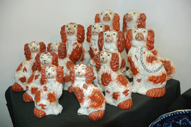 It is a rare sight to see a complete set of 12 numbered Staffordshire dogs, but Elinor Penna, Old Westbury, N.Y., assembled this "family reunion†for her display.