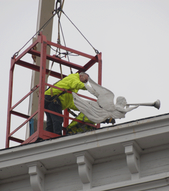 Local contractors, with a very large crane, brought the weathervane down.