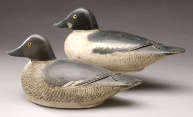The pair of working goldeneye decoys by Elmer Crowell handily exceeded the $40/60,000 estimate, selling at $109,250.