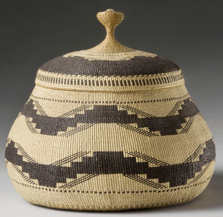 According to exhibition organizers, basketry reached heights of perfection with the work of Elizabeth Hickox (1875‱947) of the Northern California Karok/Wiyot tribe. Objects like this lidded basket with a knob handle, circa 1913, made of bear grass, maidenhair fern, conifer root and hazel, are much sought after. ⁓usan Einstein photo.  All photos courtesy of Southwest Museum of the American Indian, Autry National Center.