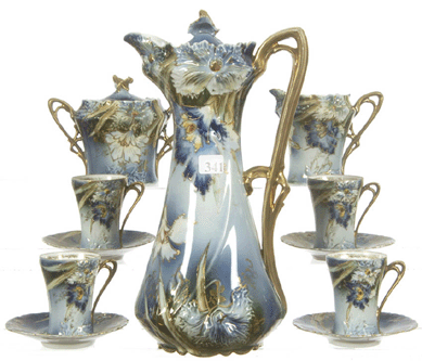 Also fetching $4,300 was this unmarked R.S. Prussia service with chocolate pot, four cups, six saucers, sugar and creamer.