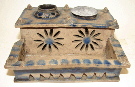 The top lot of the auction was this early Nineteenth Century blue decorated stoneware inkwell that attained $12,075.