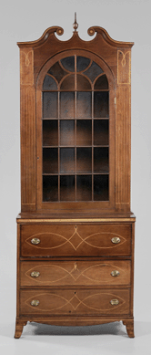The "fluted pilaster group†consisted of early Nineteenth Century furniture makers from the Catawba River Valley of North Carolina. This secretary-with-bookcase, 115 by 41¾ by 20½ inches, 1800 to 1810, is one of their few surviving examples of their later work when they only inlaid the pilasters. "We do like to have objects from known groups,†said curator of furniture Tara Gleason Chicirda at Colonial Williamsburg, which purchased the Piedmont piece for $55,200.