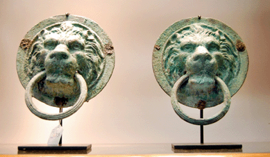 A First Century Roman bronze pair of door handles fetched $9,875.