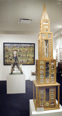 Outsider Folk Art Gallery, Reading, Penn., sold this tower by Howard Finster, shown foreground, at the show.