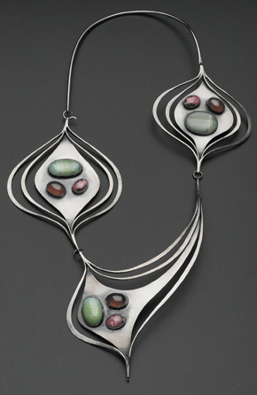 A sinuous necklace by Art Smith was made around 1958 of silver, turquoise, rhodochrosite, chrysoprase and amethyst or garnet. Photograph ©Museum of Fine Arts, Boston. Image courtesy Museum of Fine Arts, Boston, the Daphne Farago Collection.