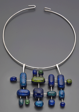 "Space Pendant with Circlet†was created by Elsa Freund, about 1960, of silver, glass and terra cotta "stones.†It alludes to forms in space. Photograph ©Museum of Fine Arts, Boston. Image courtesy Museum of Fine Arts, Boston, the Daphne Farago Collection.