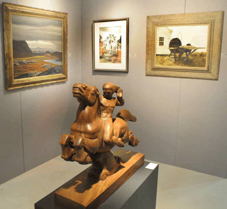 The Roy King wooden sculpture "Horse and Rider†was flanked by works by Rockwell Kent, Charles Burchfield and Andrew Wyeth from the Tom Veilleux Gallery, Portland, Maine.