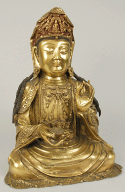 Thought to be from the Fifteenth Century, this Chinese gilt-bronze figure of a seated deity sold for $57,500.