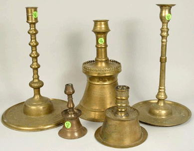 A lot of five Turkish brass candleholders drew a bidding competition that ended when a bidder in the gallery prevailed at $13,800.