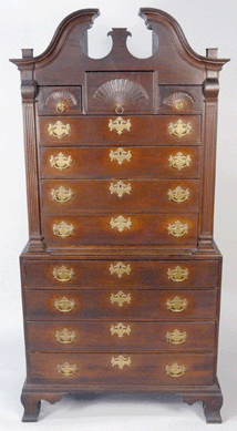 A Chippendale cherry bonnet top chest-on-chest made in Concord, Mass., sold for $10,638.