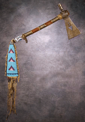 Fetching $37,950 after heated bidding from the floor and phones was this circa 1870 Blackfeet tomahawk and beaded drop.