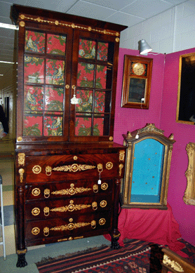 A New York State secretary bookcase, 1810‱829, from Chelsea Hill Antiques, Hampton, Conn.