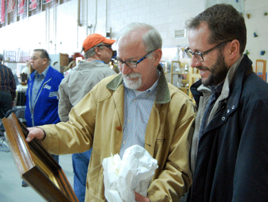 Steve Fletcher and Michael Walden examine one of their purchases at the Holliston show.