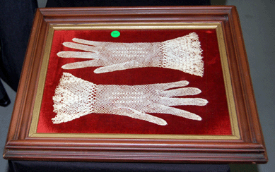 A cased pair of gloves from The Antique and Estate Company of Wolfeboro, N.H.