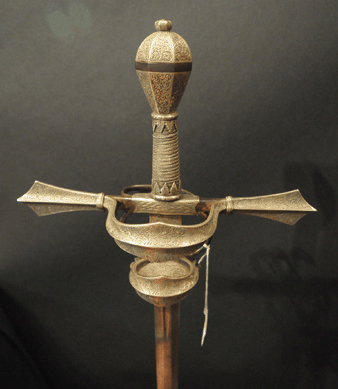 The German sword, circa 1590, had a hilt of blue steel, pommel, quillions and branch terminals capped with engraved silver. The eight-sided pommel was engraved with an intricate foliate design. The rare sword sold for $28,750.