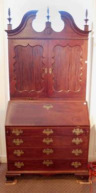 The Massachusetts Chippendale mahogany secretary bookcase by Jacob Sanderson of Salem sold for $56,050.