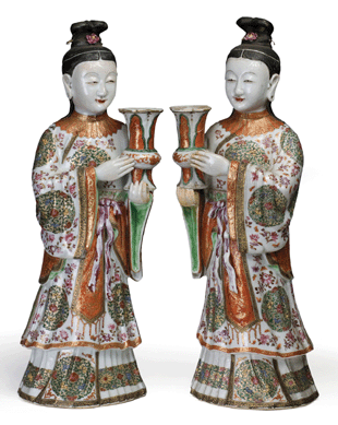 The Eighteenth Century pair of Chinese Export porcelain figures of robed court ladies, each holding a candleholder, was exceptionally large at 16 inches and sold for $31,860.