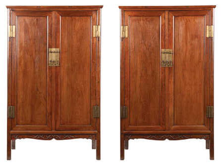 Pair of Chinese huanghuali cabinets, Eighteenth Century, height 64 inches, width 38¼ inches, depth 20¼ inches, sold for $512,500.