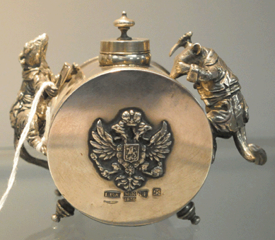 Four phone bidders pushed the price on the whimsical Russian silver inkwell to $4,025.